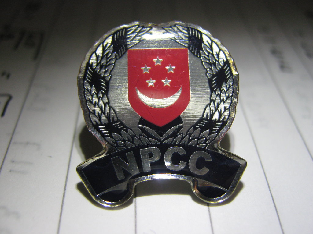 NPCC_Collar_Badge_by_gigabytemon.jpg